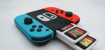 真爱粉来一套?迷你Switch卡带包装盒竟是钥匙链